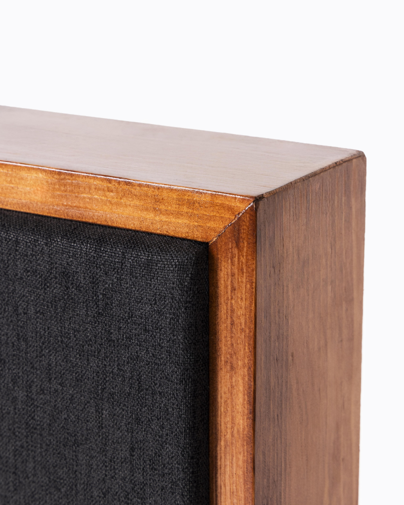 Wooden frame with a textured black interior on a white background | Room Control Authority